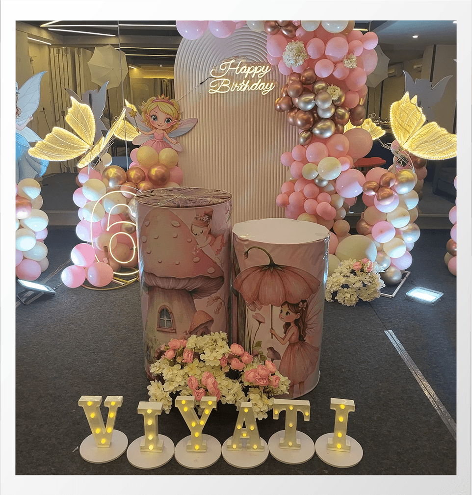 Kids birthday decoration with balloons and cake setup 1