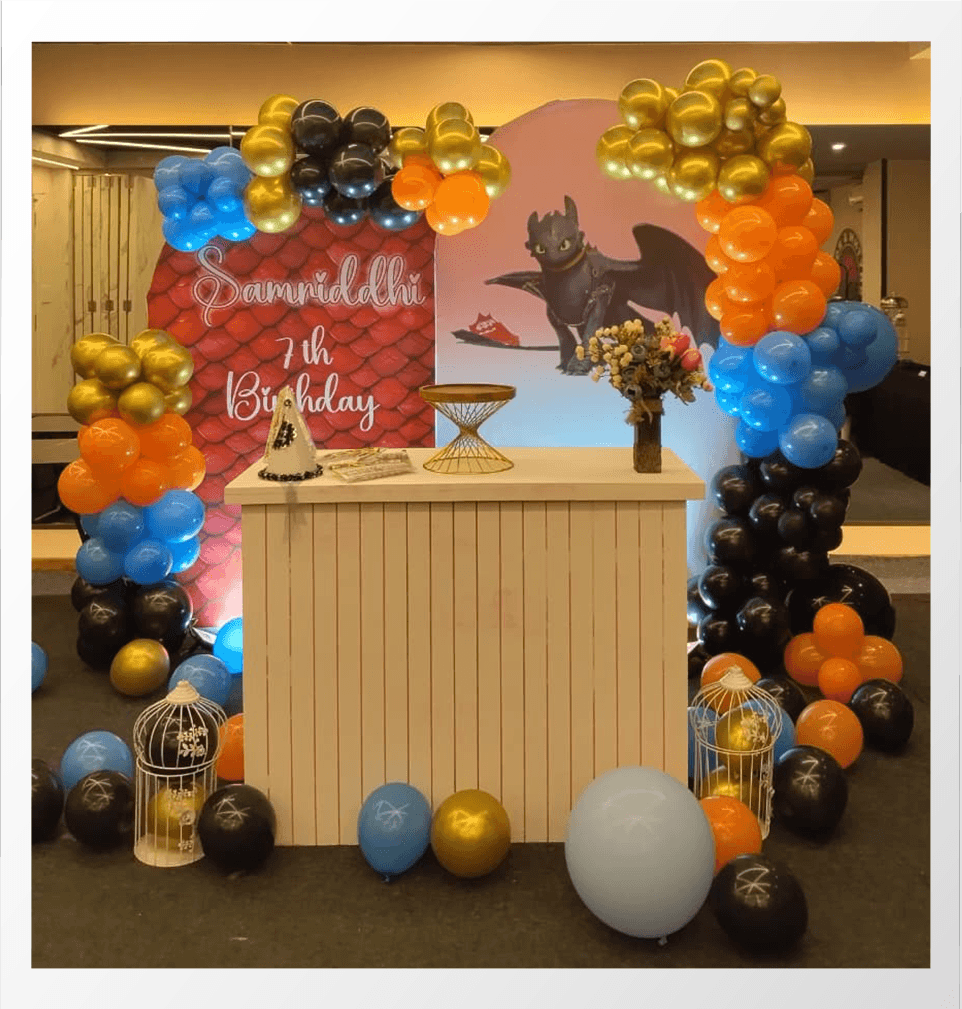 Kids birthday decoration with balloons and cake setup 11